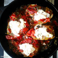 Early girl tomatos, padron peppers, and purslane baked with thick slices of bread and ricotta